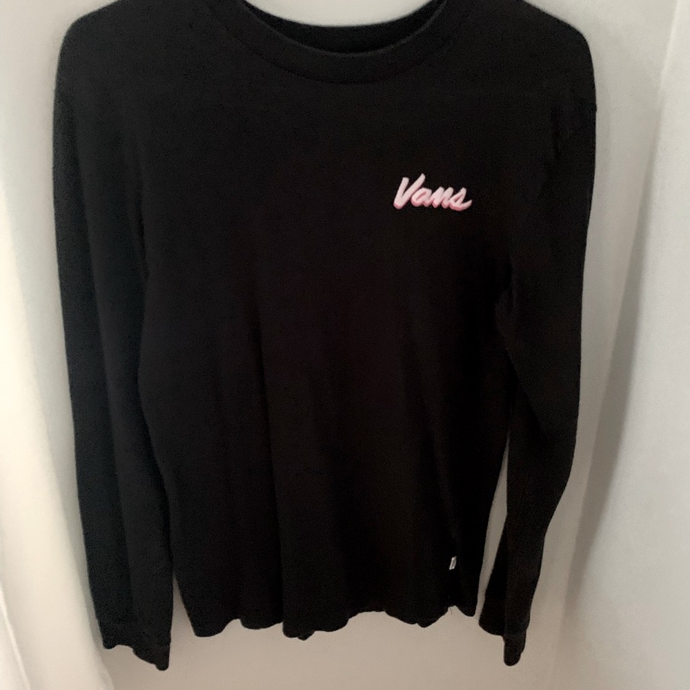Black Vans long sleeve shirt that has pink lettering on the left arm